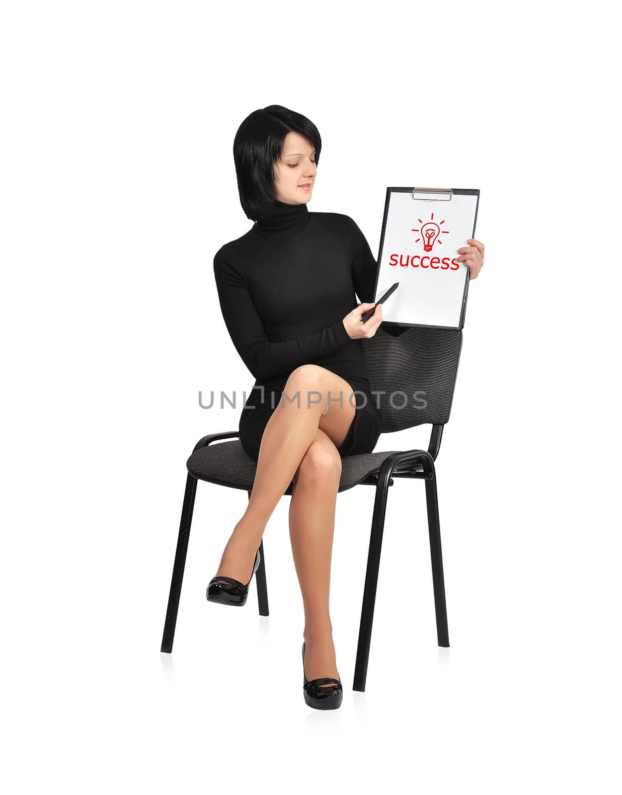 businesswoman sitting on chair with success symbol on clipboard