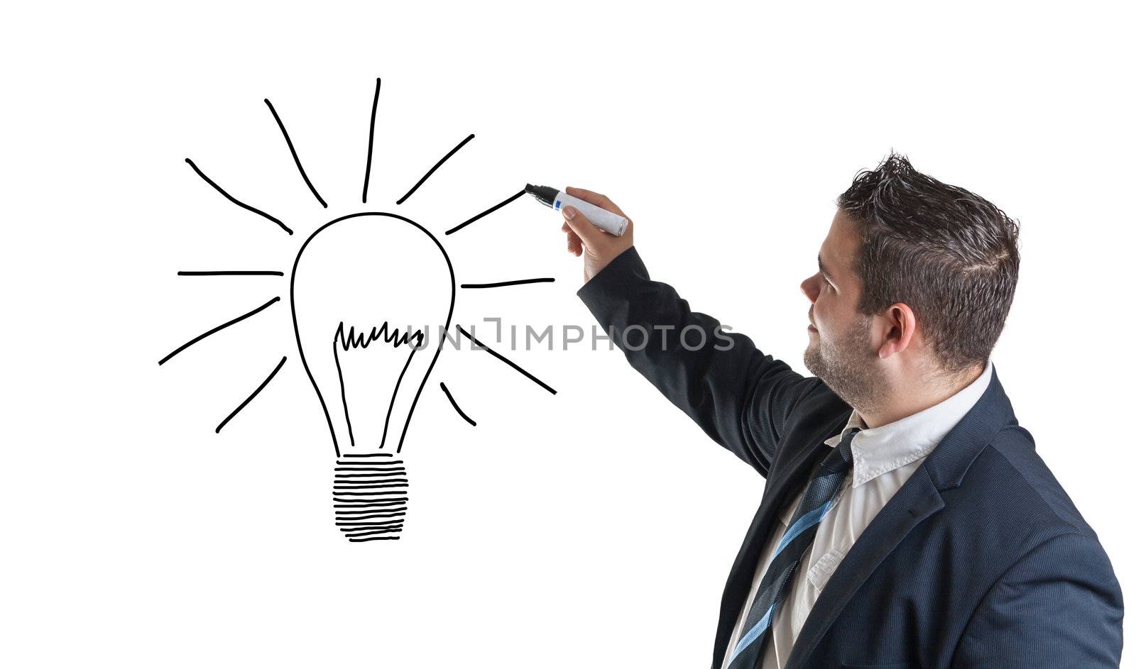 Business man drawing an creativity concept on a whiteboard