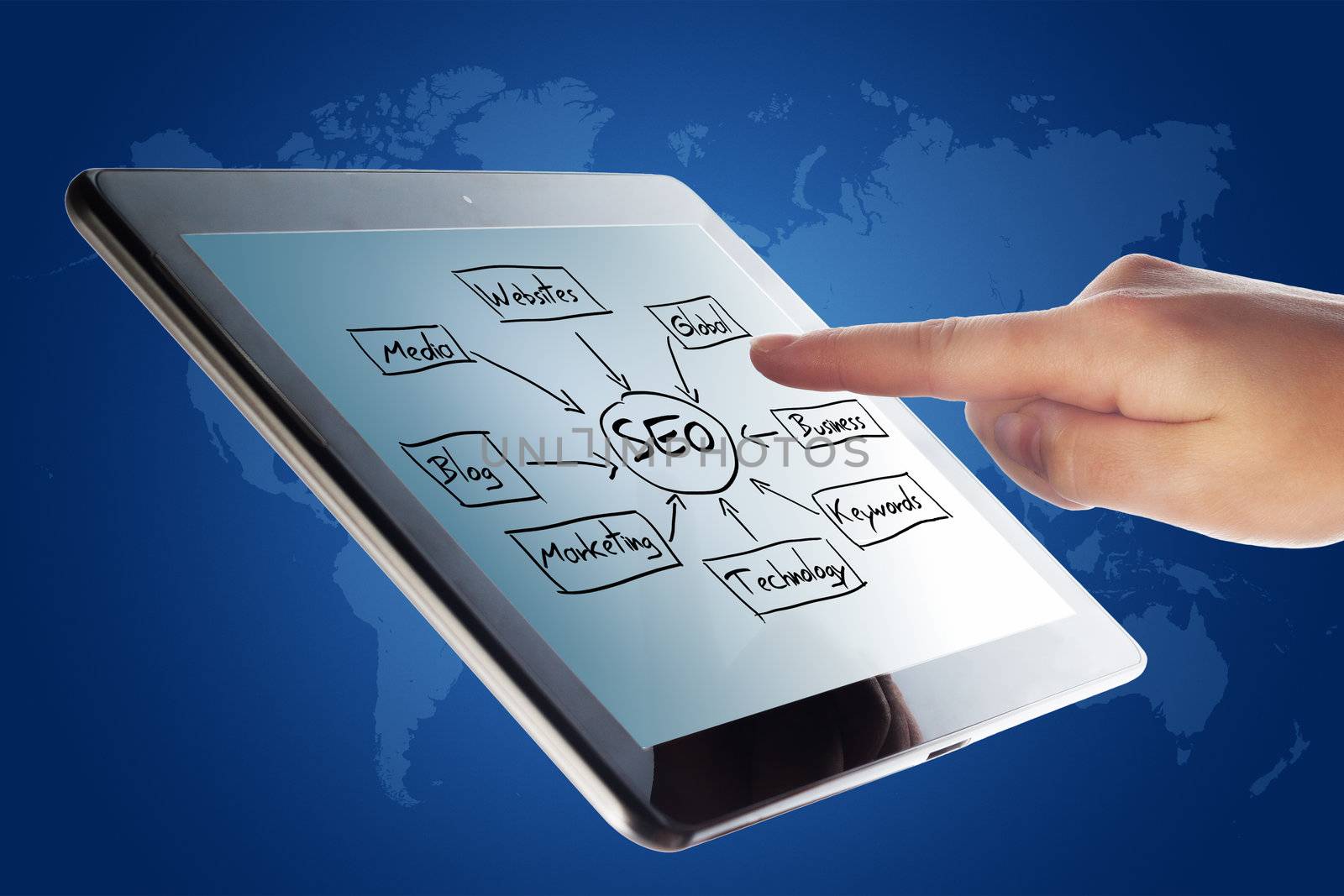 Tablet Computer with a SEO schema and a hand on blue background with world map