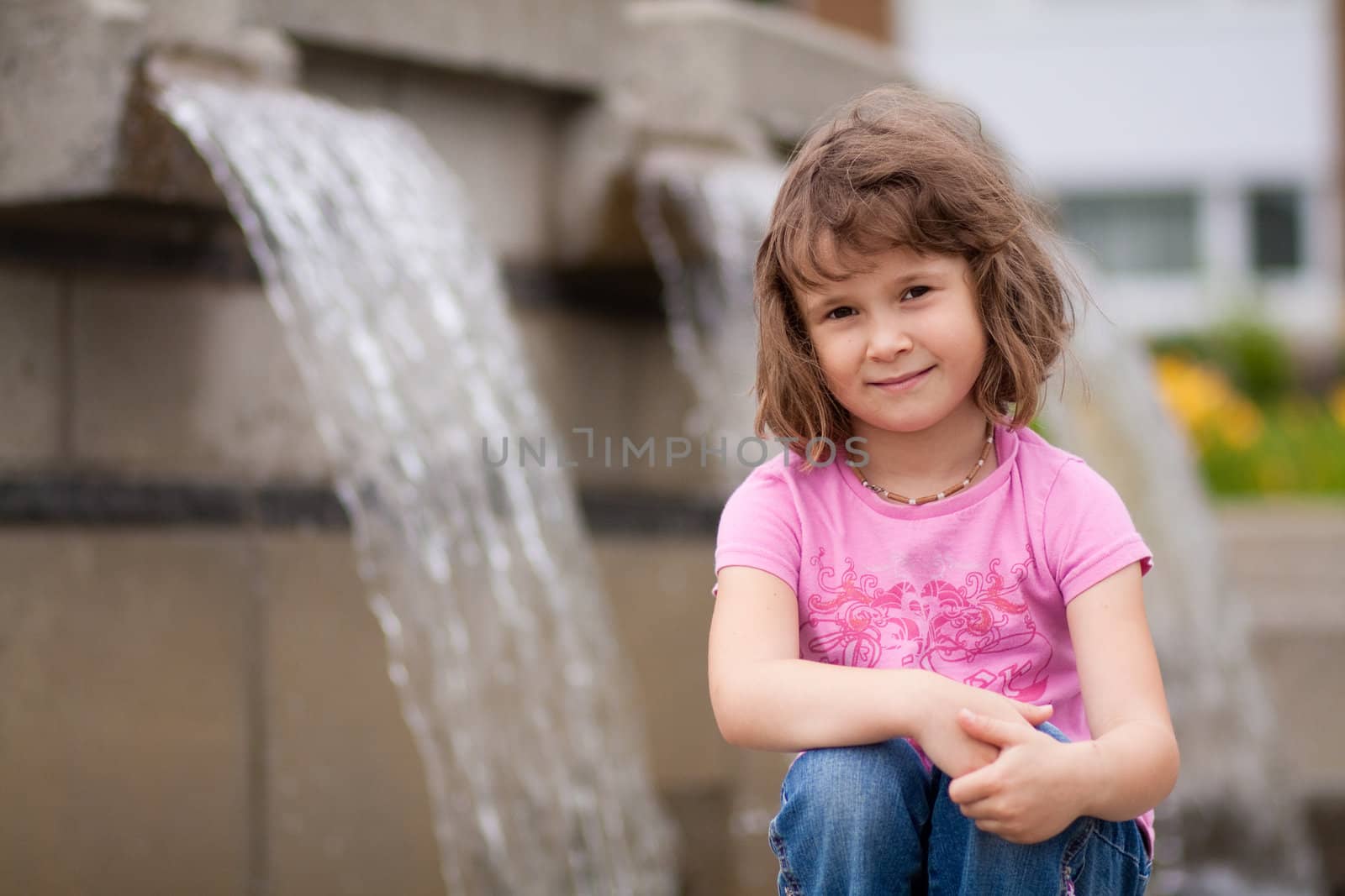 Girl sitting by waterfall by Talanis