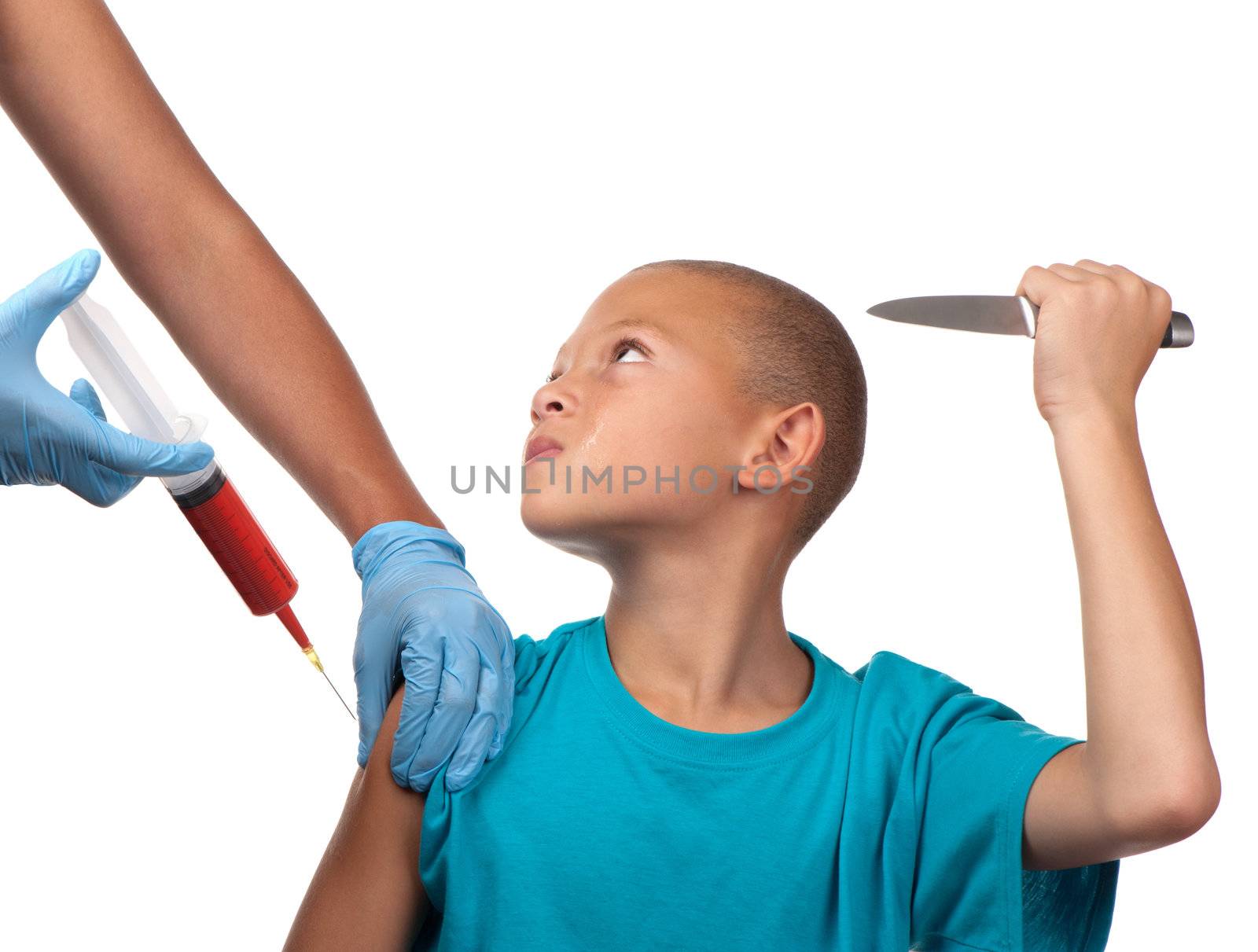 A boy threatens to stab a healthcare worker with a knife should the needle penetrate his skin.