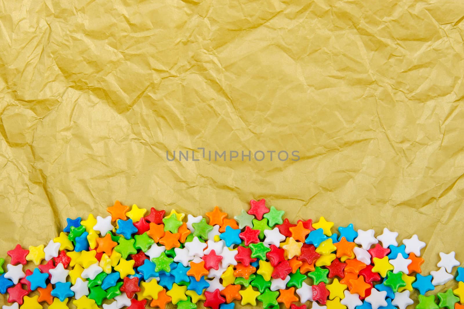 Multicolored stars on a background of crumpled paper by velislava