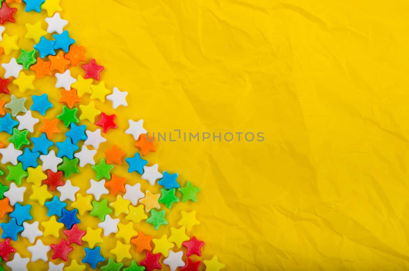 Multicolored stars on a background of crumpled paper by velislava