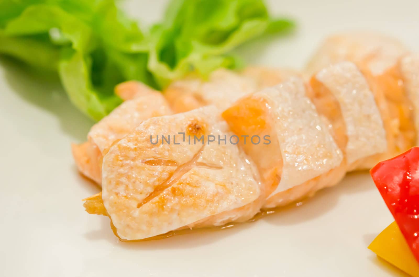 Grilled salmon belly served with fresh vegetable