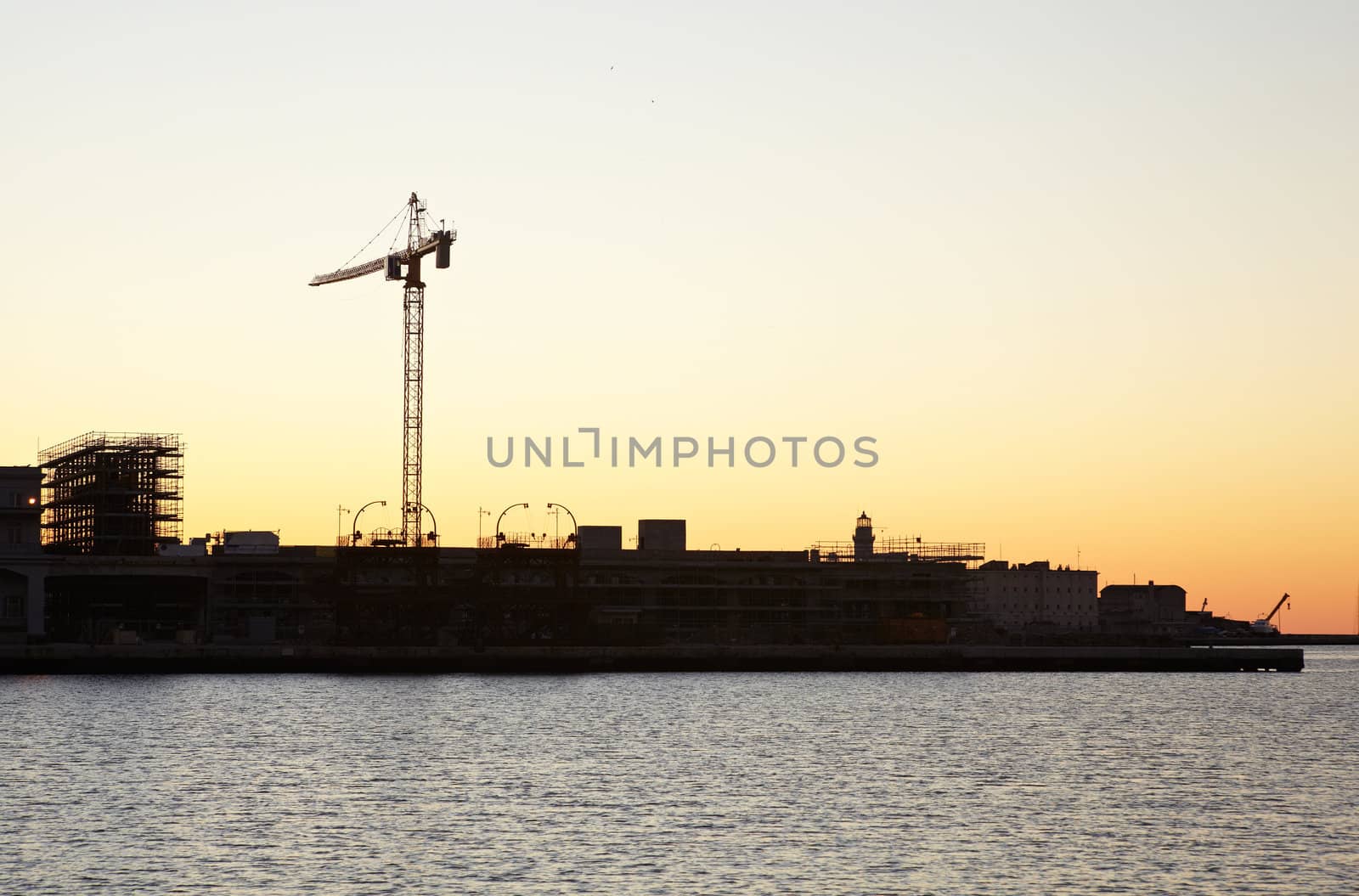 View of Trieste harbor at sunset, Italy