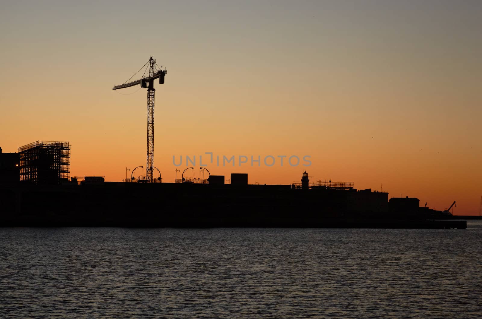 View of Trieste harbor at sunset, Italy
