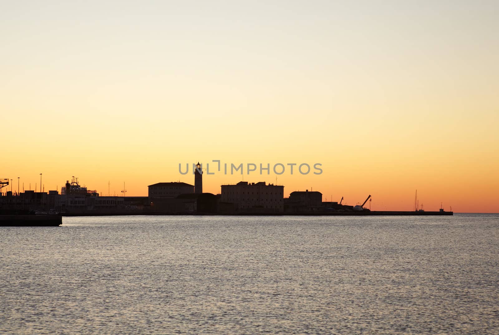 View of Trieste harbor at sunset, Italy