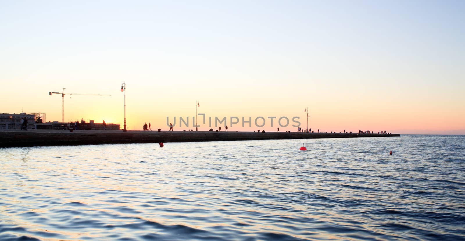 View of molo Audace at sunset, Trieste - Italy