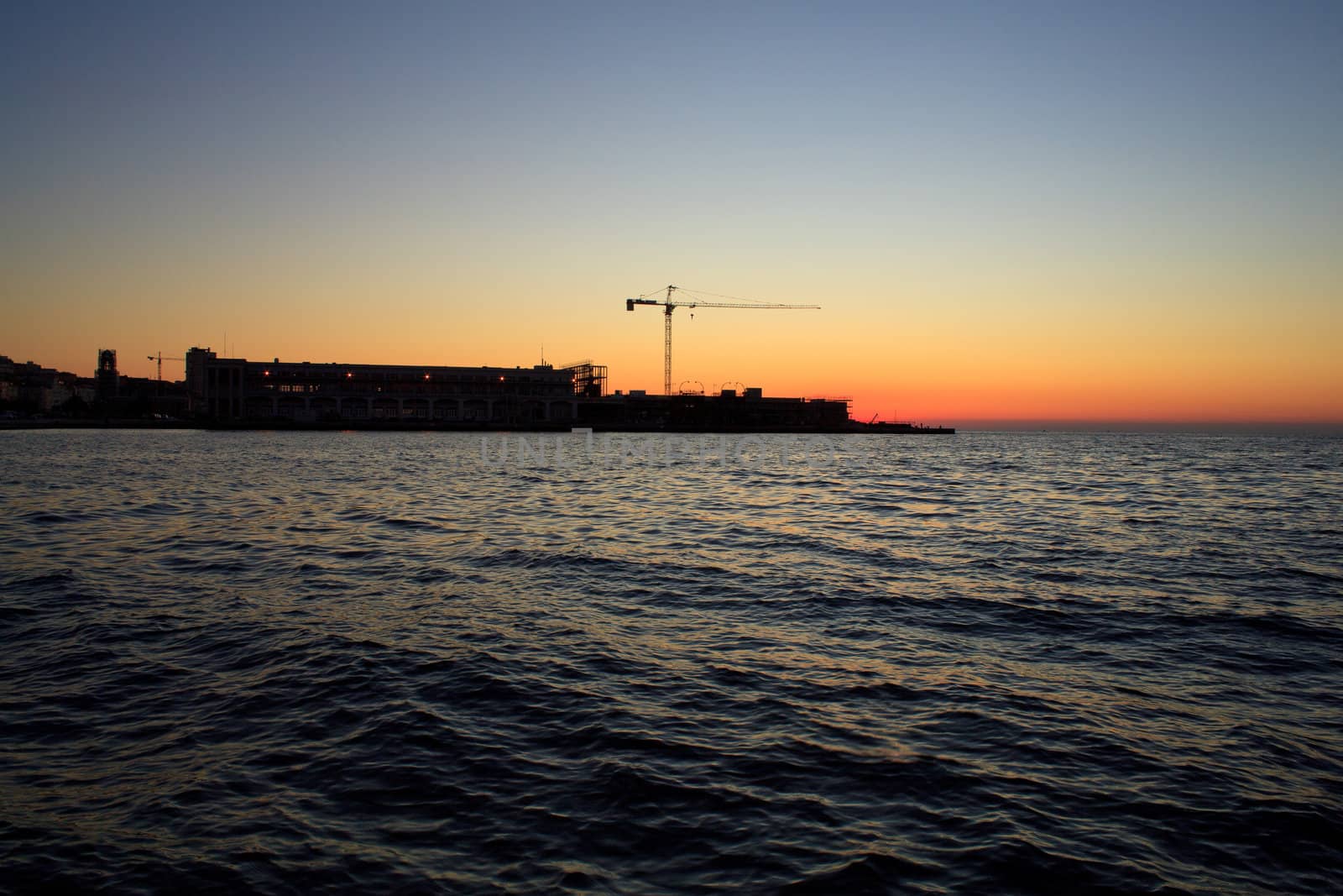View of Trieste harbor at sunset, Italy