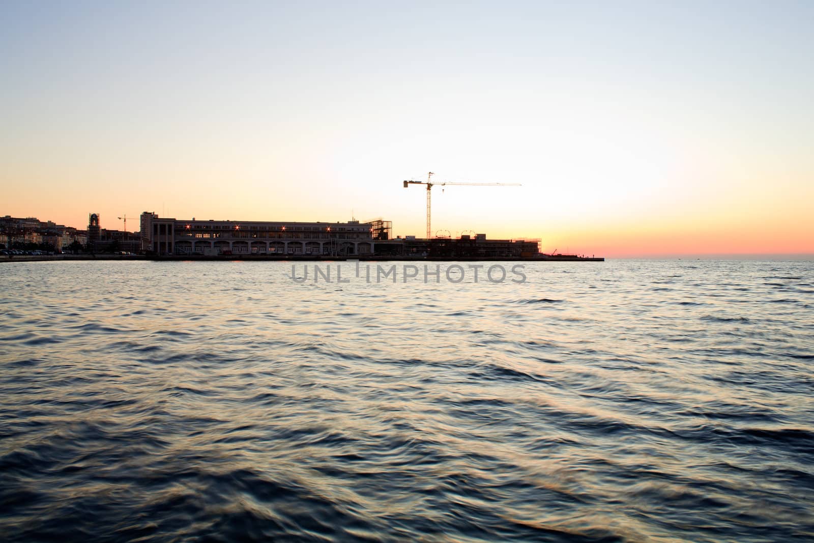 View of Trieste harbor at sunset, Italy