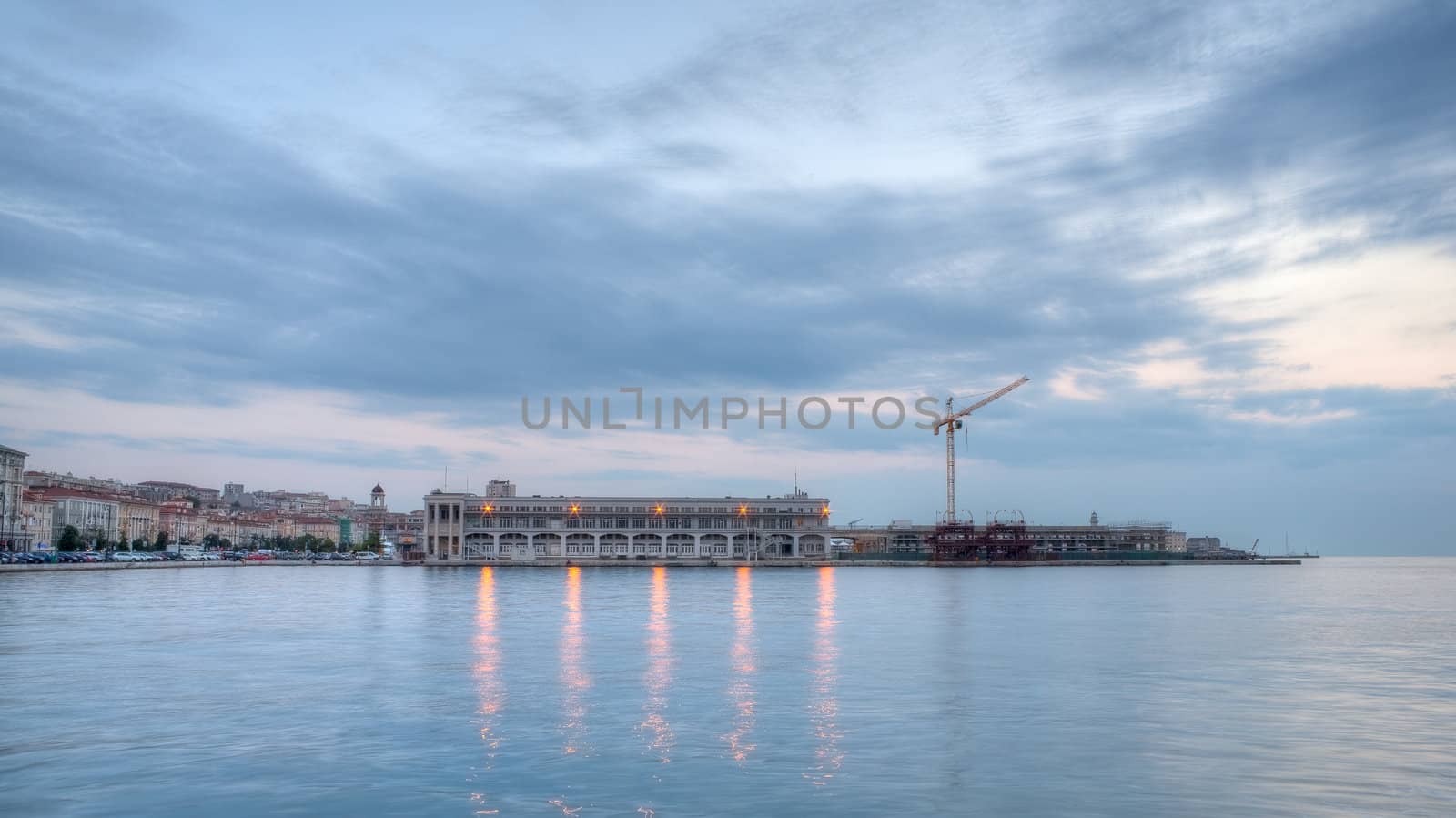 View of Trieste harbor at sunset, Italy
