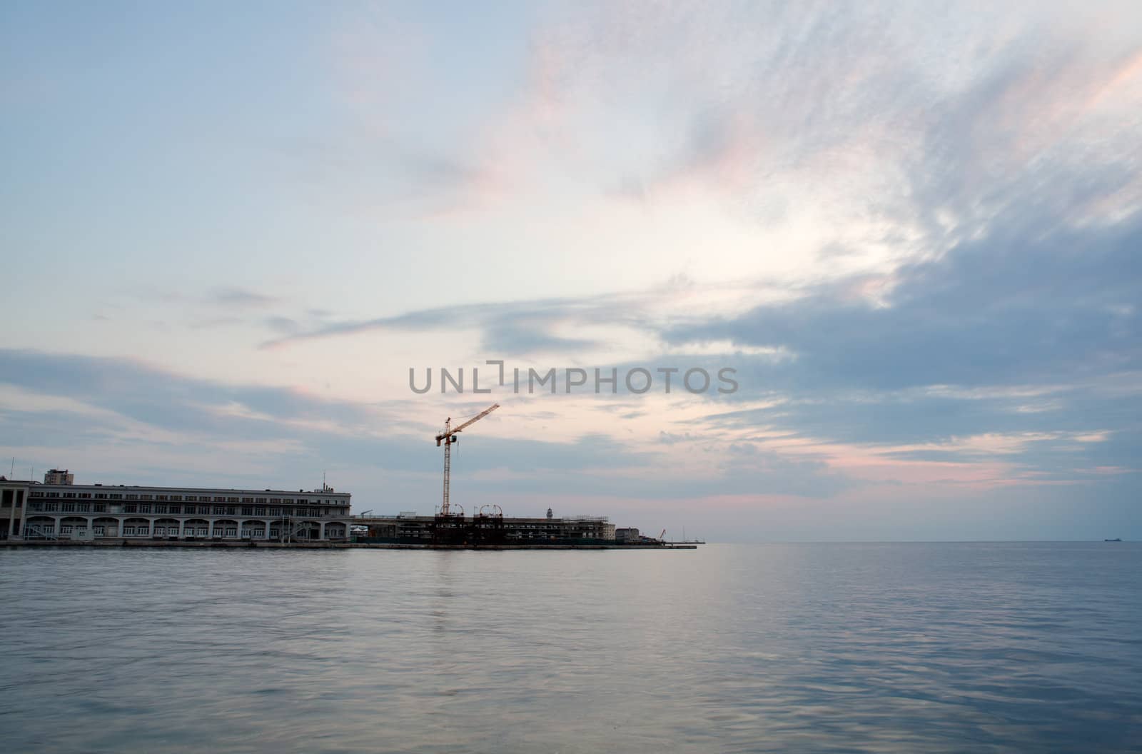 View of Trieste harbor at sunset, Italy