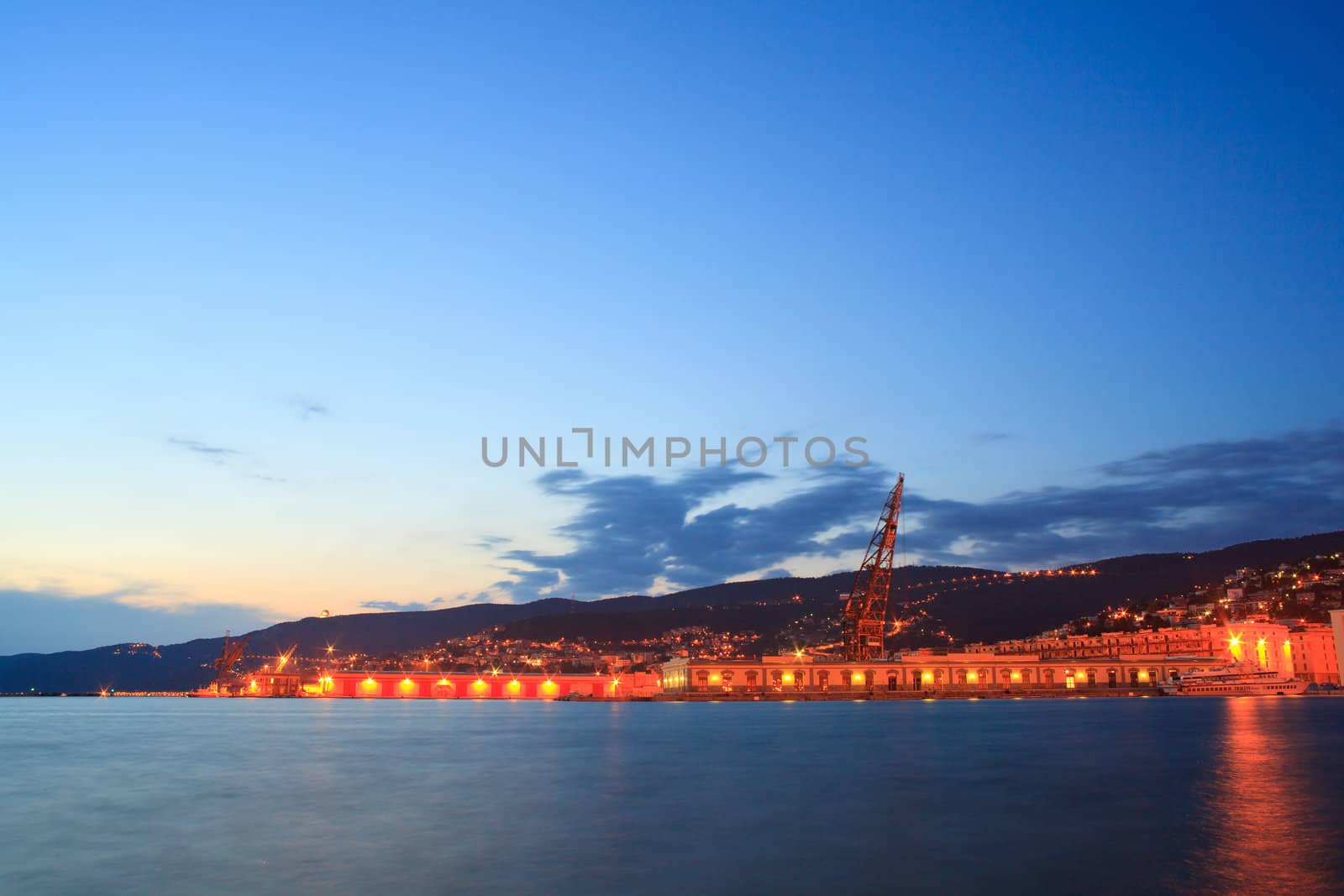 View of Trieste harbor at sunset, Italy