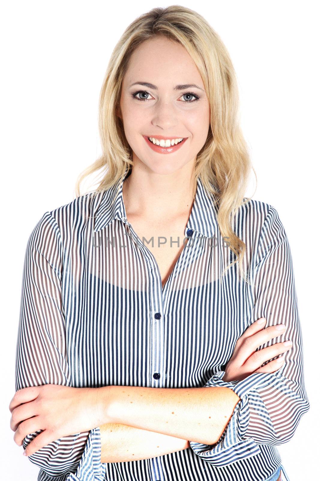 Happy confident blonde woman with a radiant smile and arms folded standing on a white studio background Happy confident blonde woman with a radiant smile and arms folded standing on a white studio background