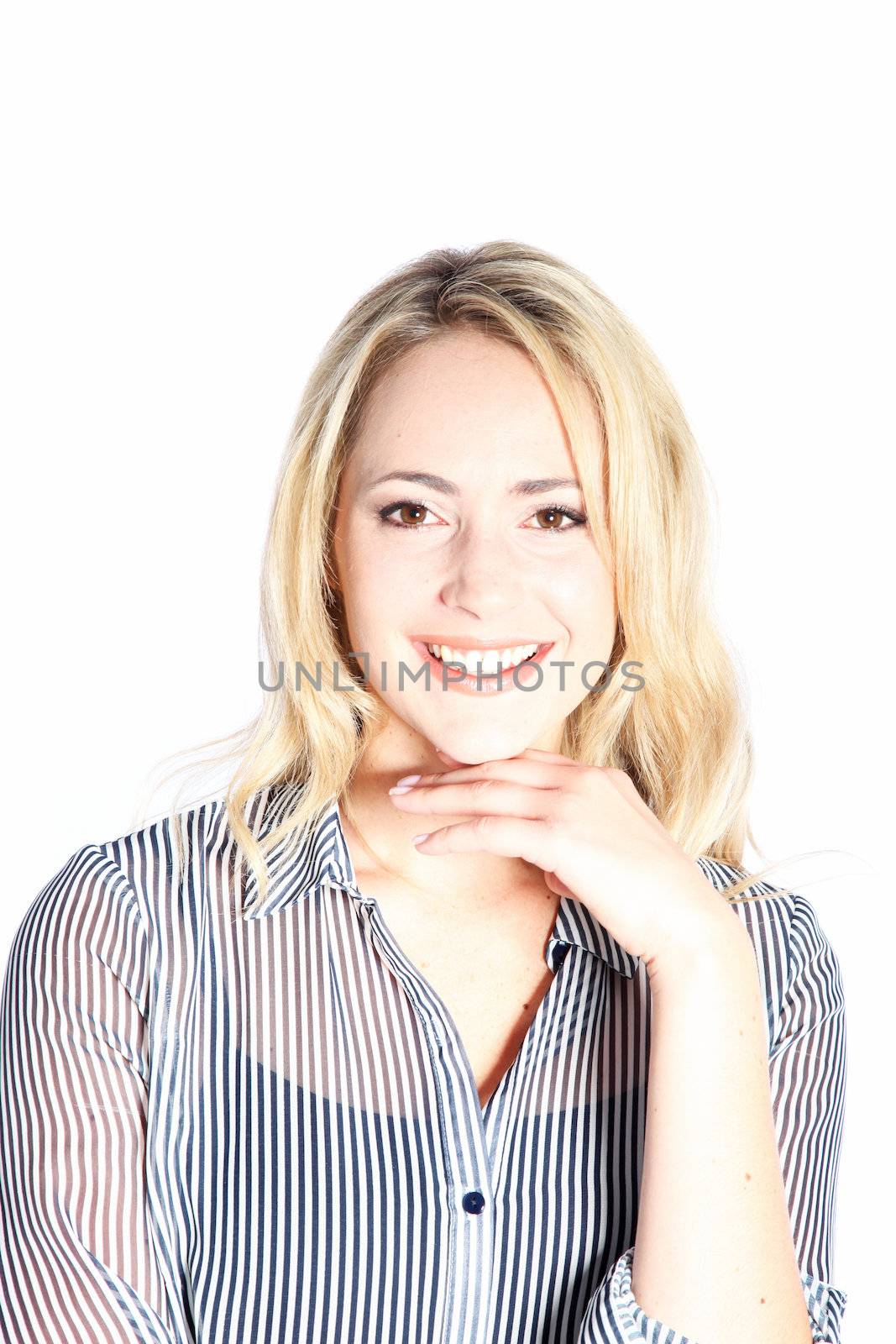 Portrait of a smiling confident young blonde woman with her hand to her chin isolated on white Portrait of a smiling confident young blonde woman with her hand to her chin isolated on white