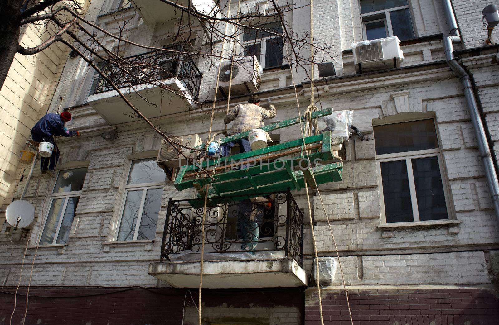 Photo of Construction workers on scaffold