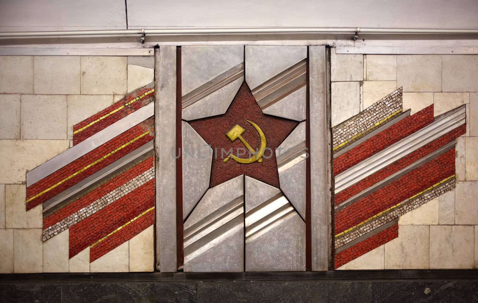 Red star sickle and hammermosaic in the metro of Kiev metro