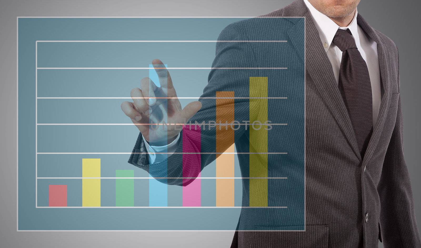 business man touching graph on screen, grey background