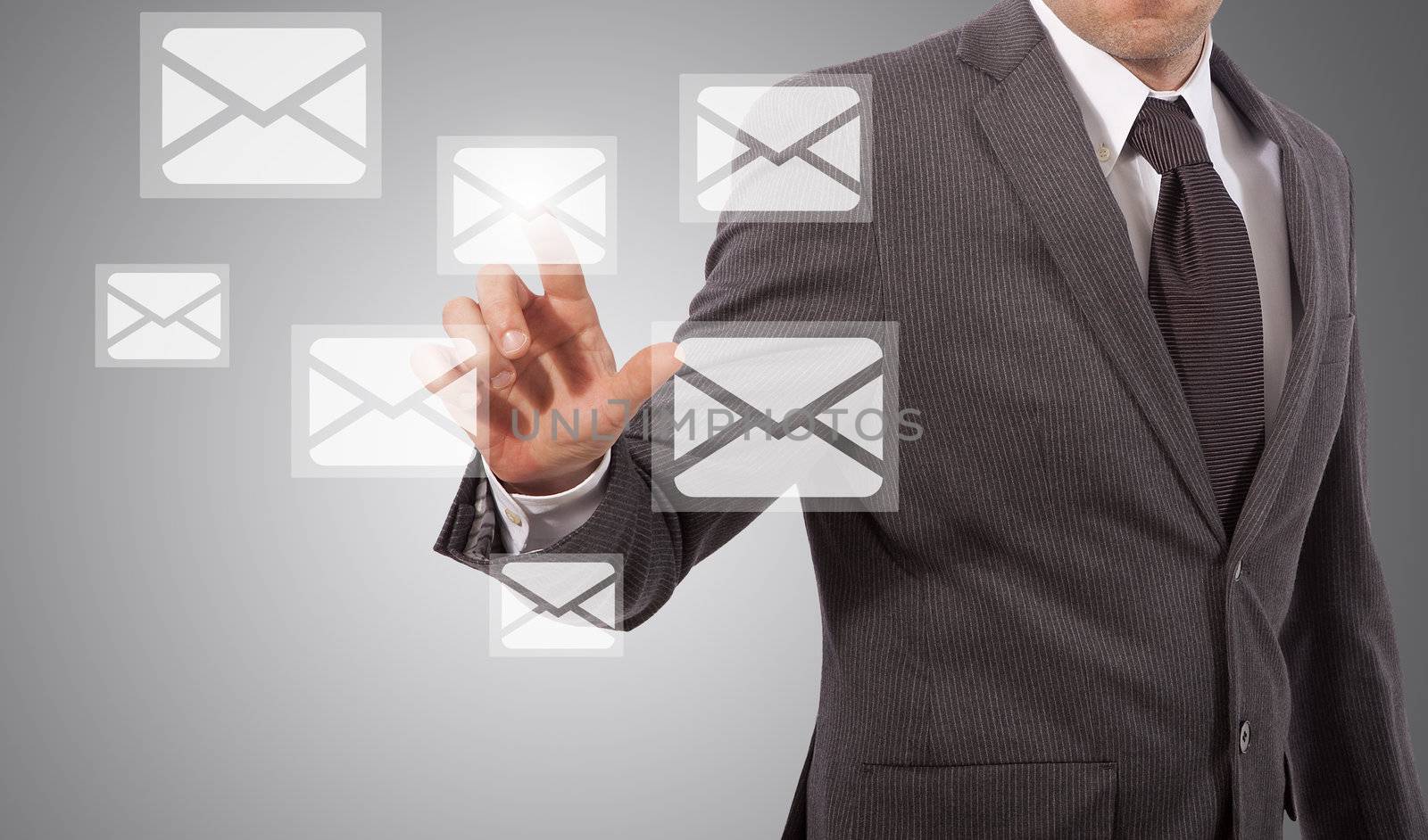 business man open email touching icon on screen, grey background