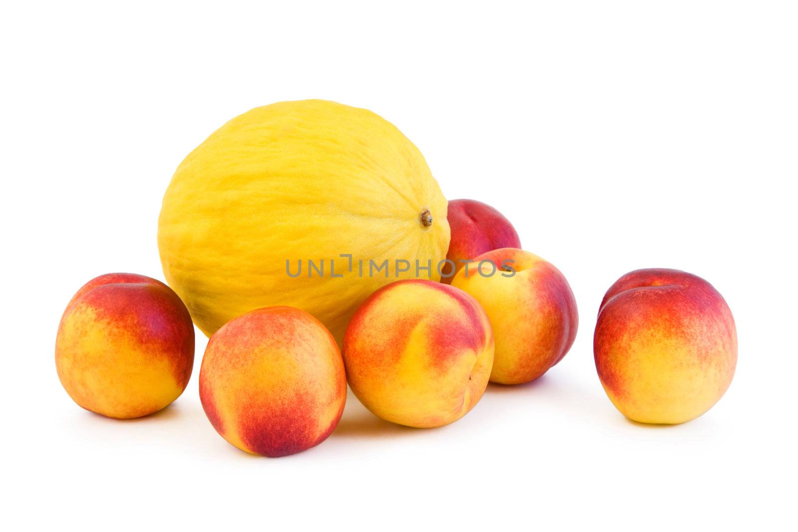 Fresh peaches and yellow melon fruit isolated on white