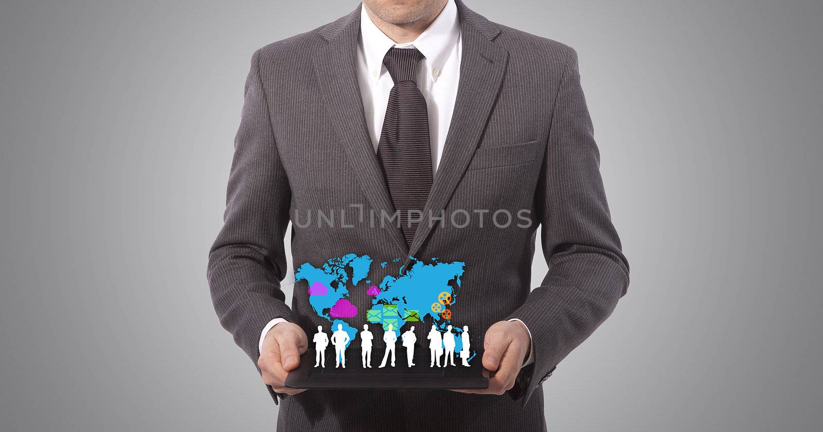 business man with touch tablet in hands, grey background. world map from www.lib.utexas.edu