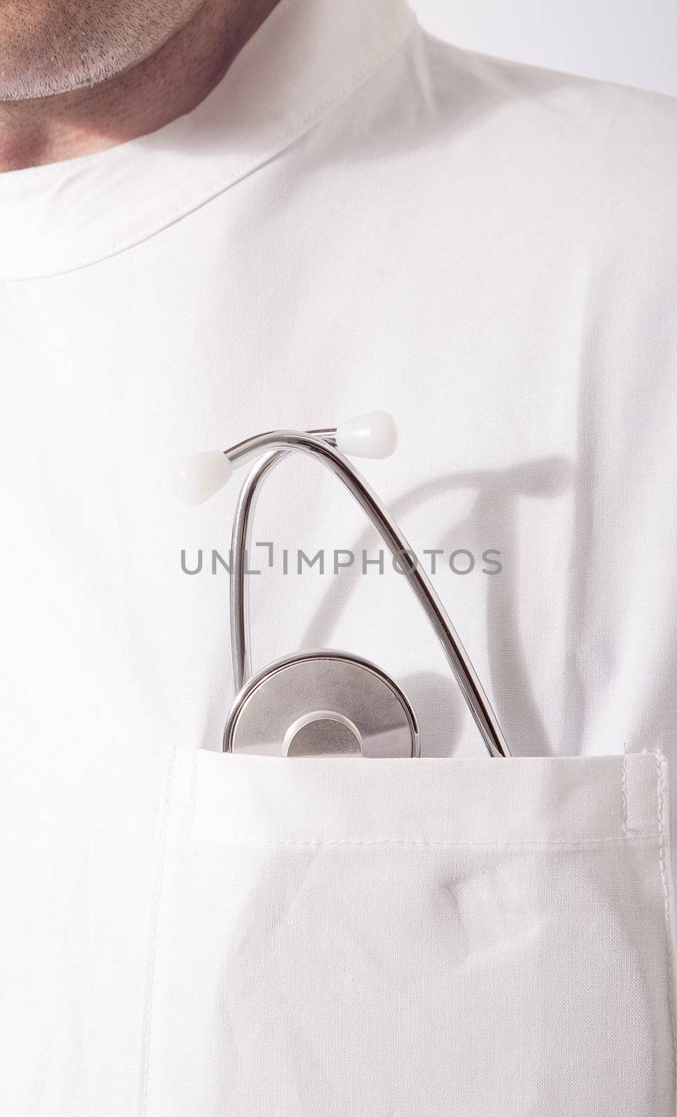 mature doctor with stethoscope in the pocket