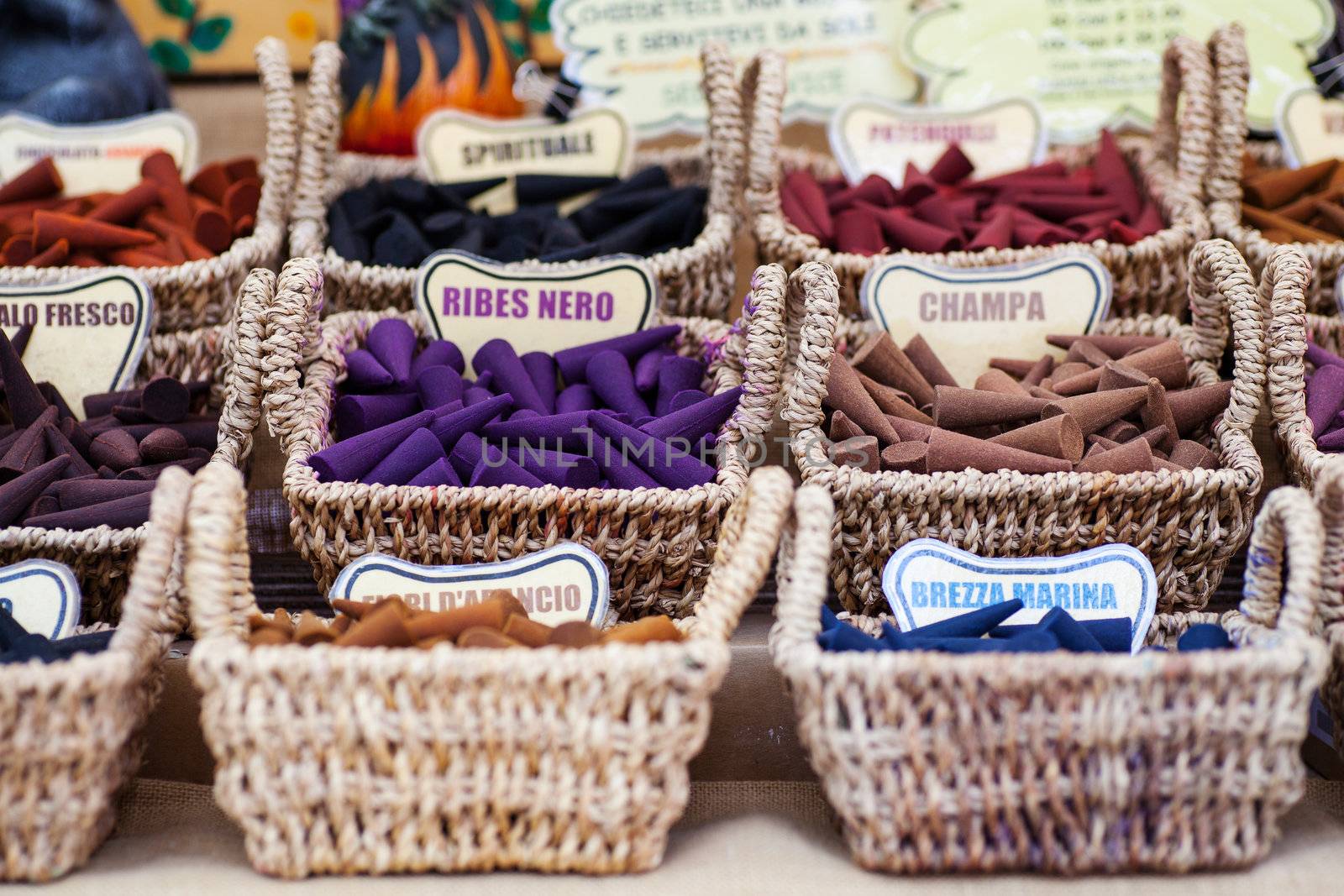 A lot of various scented Incense inside the wicker baskets