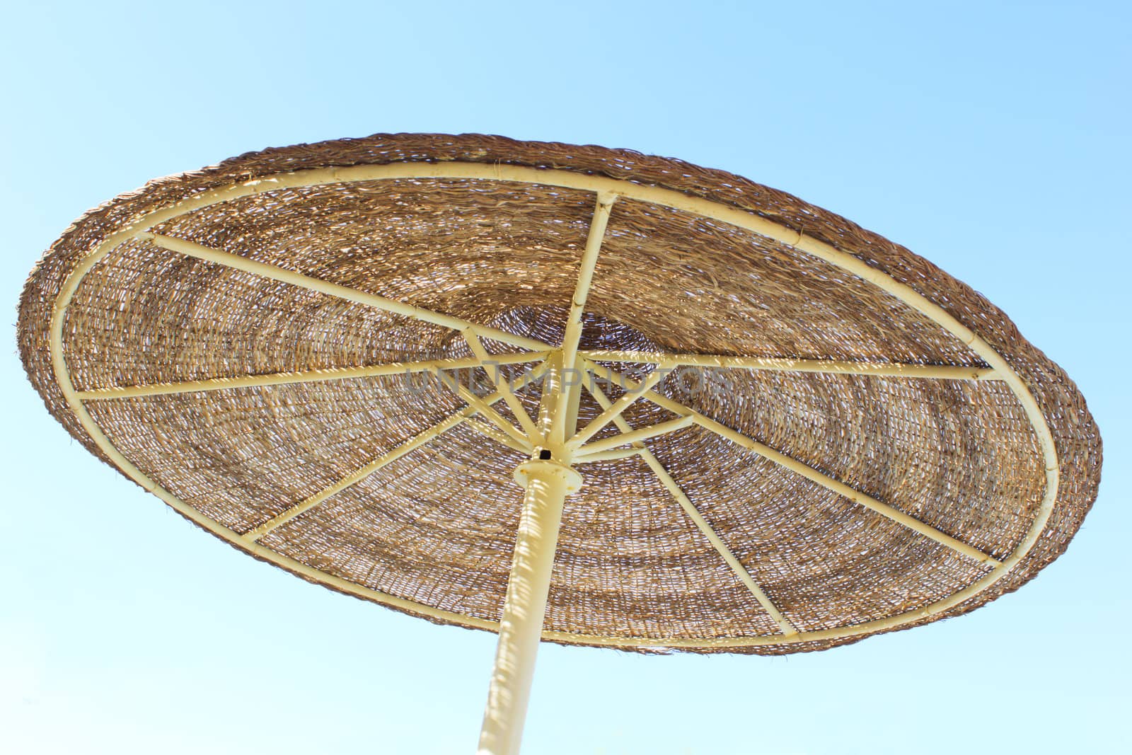 Parasol and blue sky by Brigida_Soriano