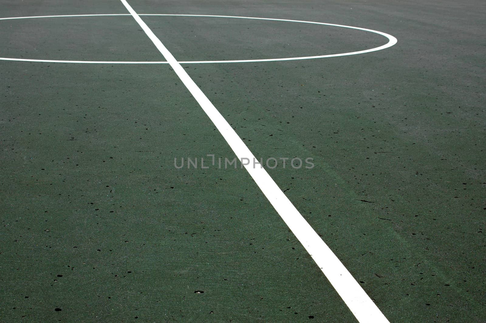 Sports image of lines on a weathered basketball court