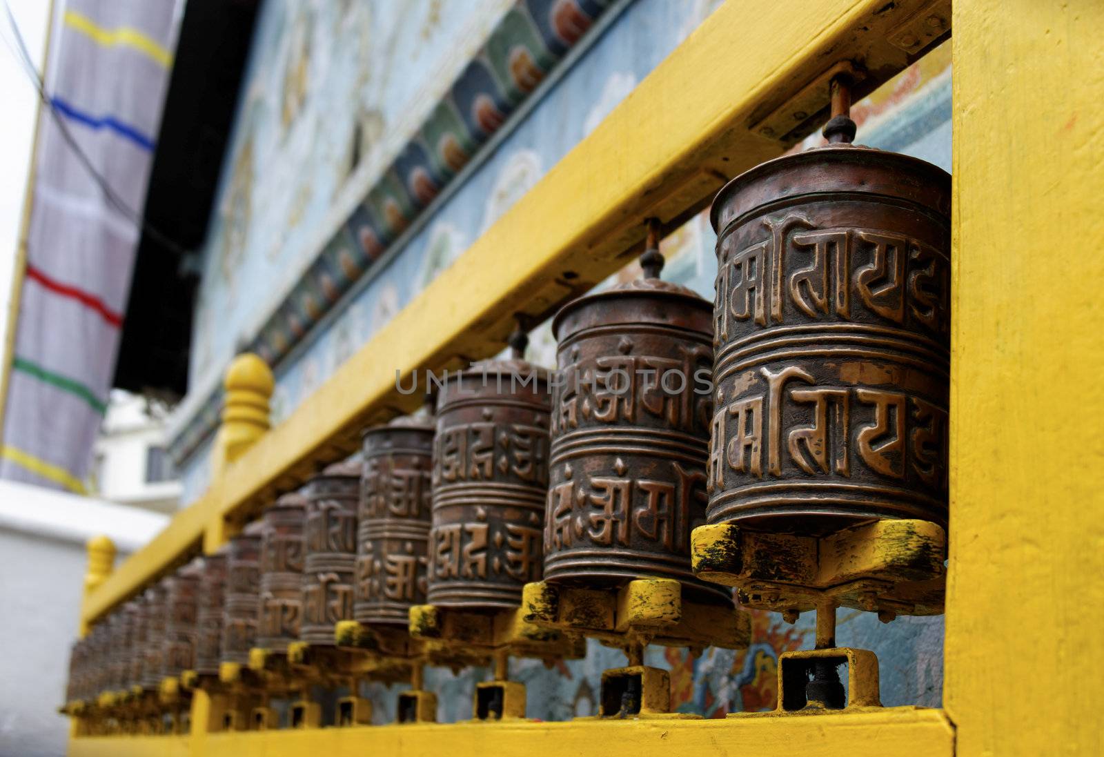 Prayer wheels at Bodhnath stupa in Kathmandu, Nepal