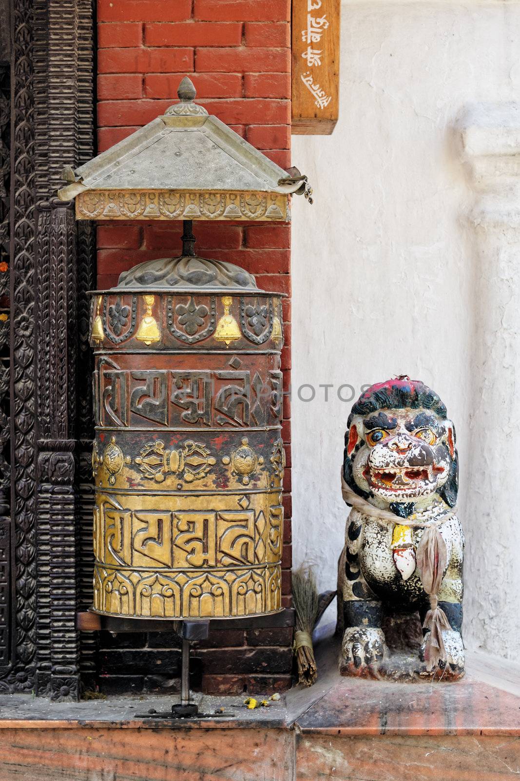 Prayer wheel at Bodhnath stupa in Kathmandu by dutourdumonde