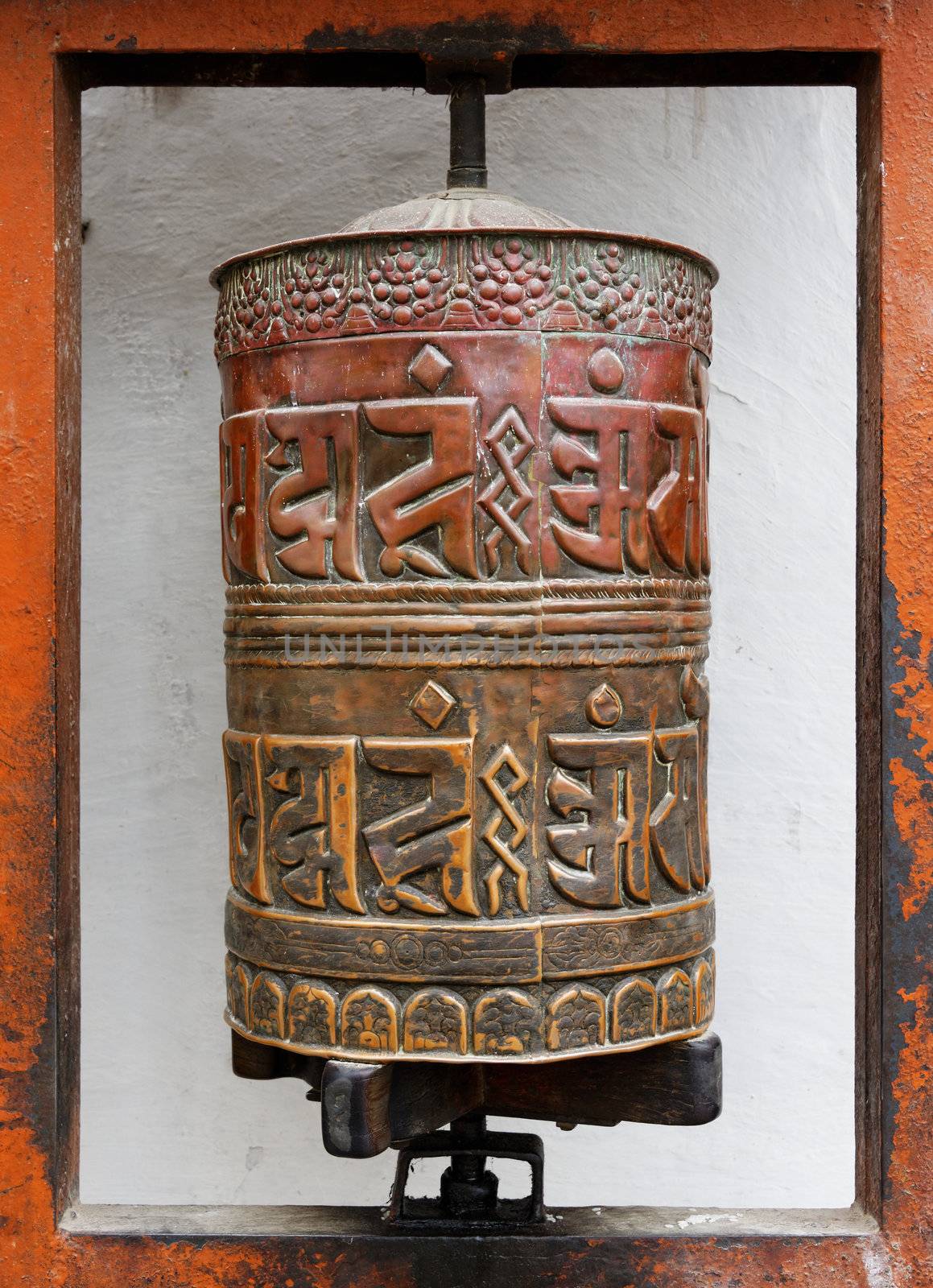 Prayer wheel at Bodhnath stupa in Kathmandu by dutourdumonde