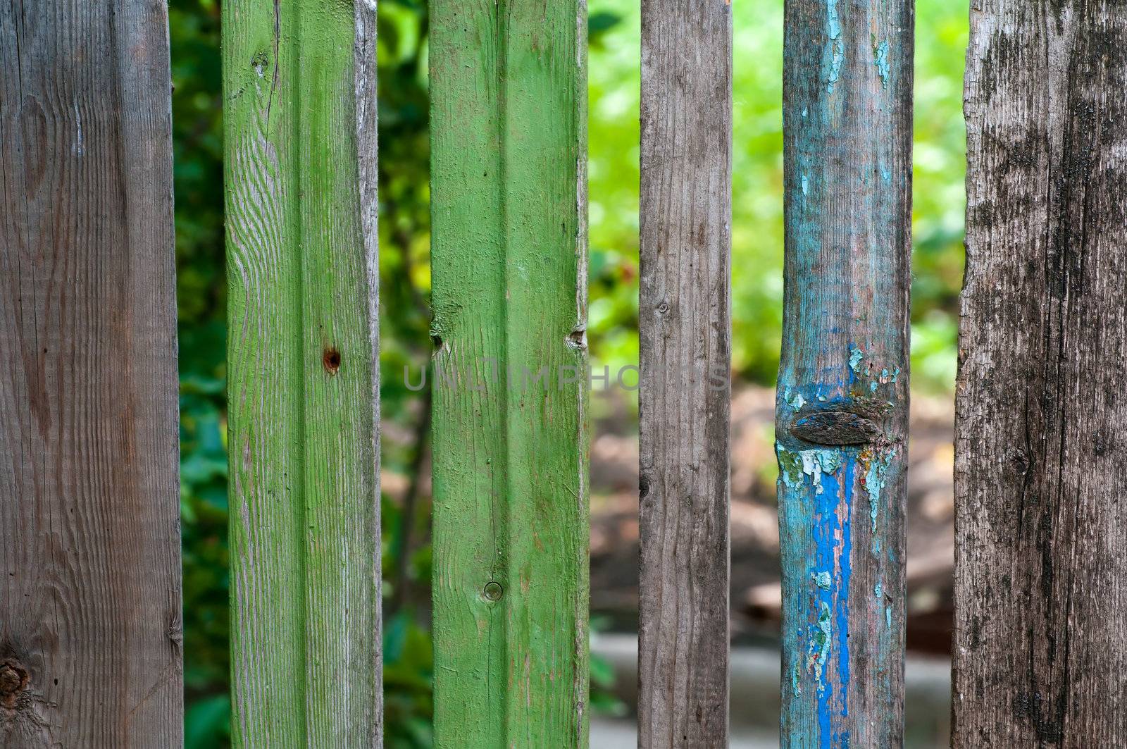 Old fence in village. Rhythm pattern