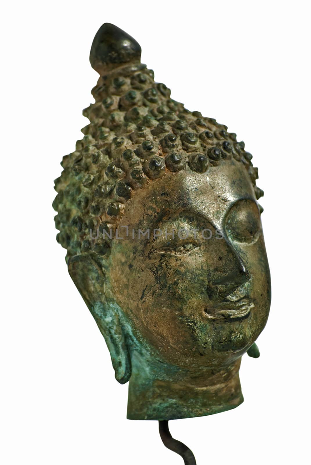 Buddha bronze head closeup isolated on white background