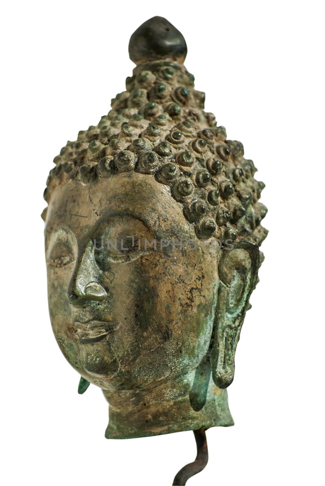 Buddha bronze head closeup isolated on white background