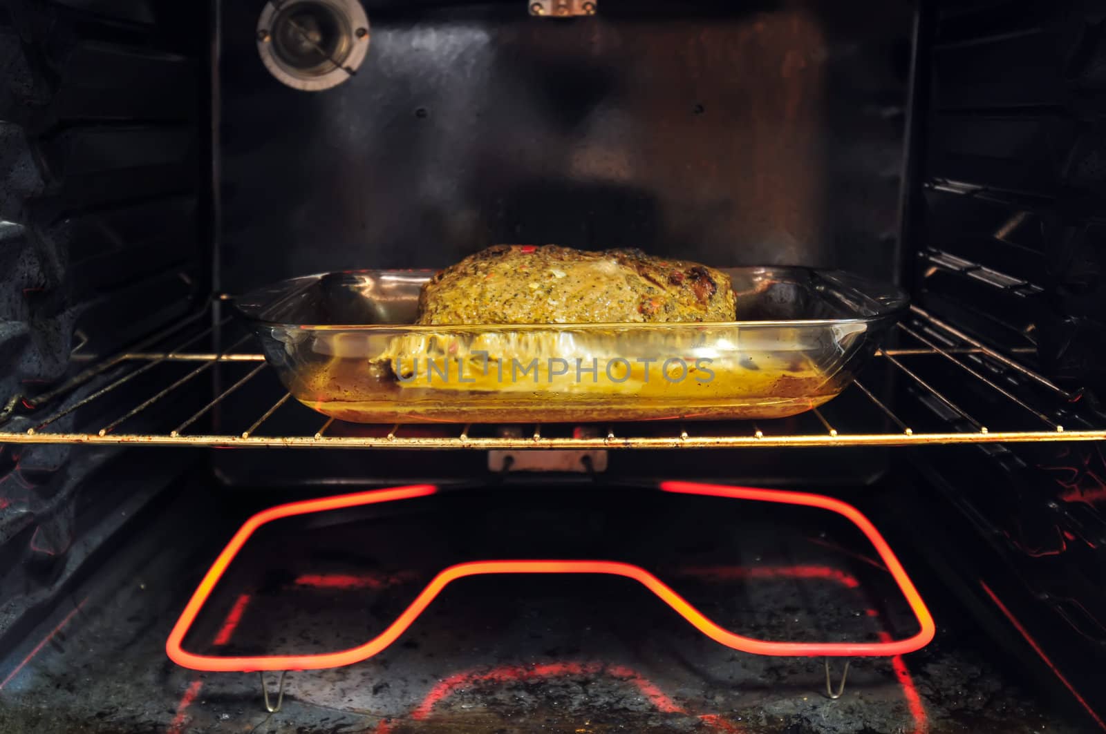 pork tenderloin in oven baking by digidreamgrafix