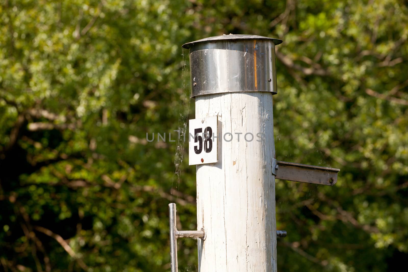Photo of a Pole with fifty eight number