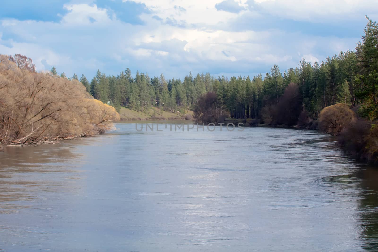 water flows slowly in spokane river washington