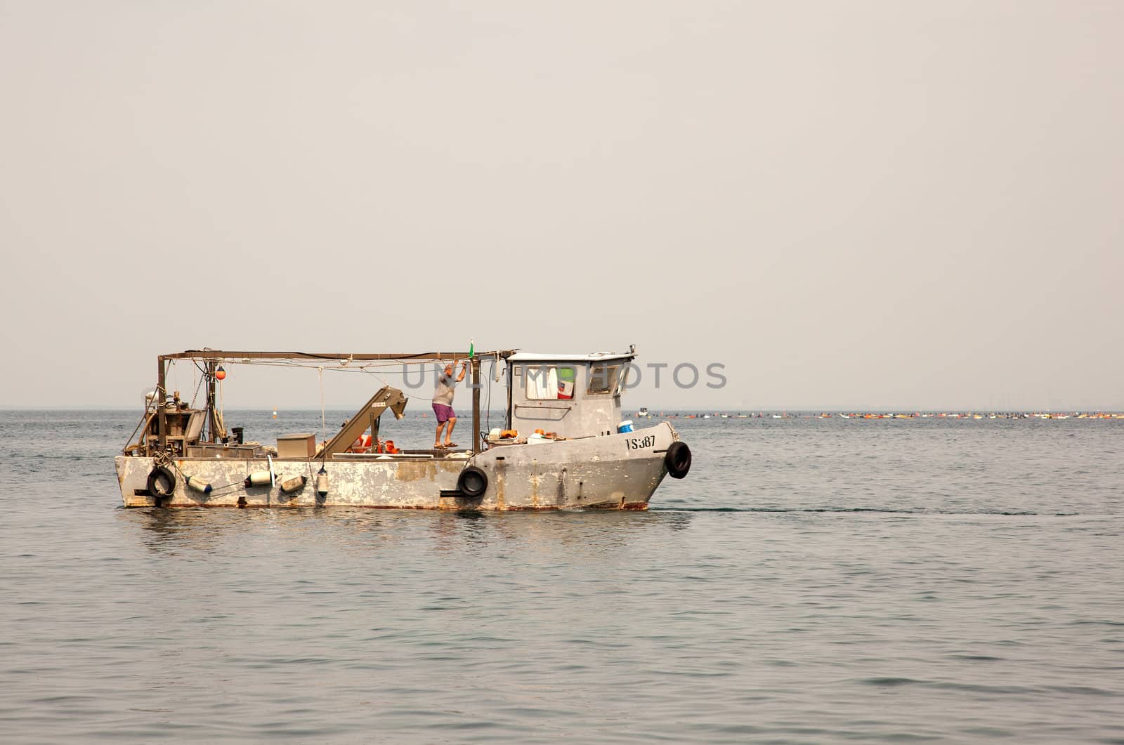 Old fisher boat in the Trieste sea