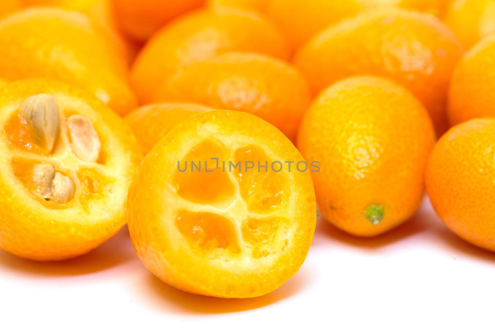 Heap Kumquat fruit (Fortunella) by Discovod