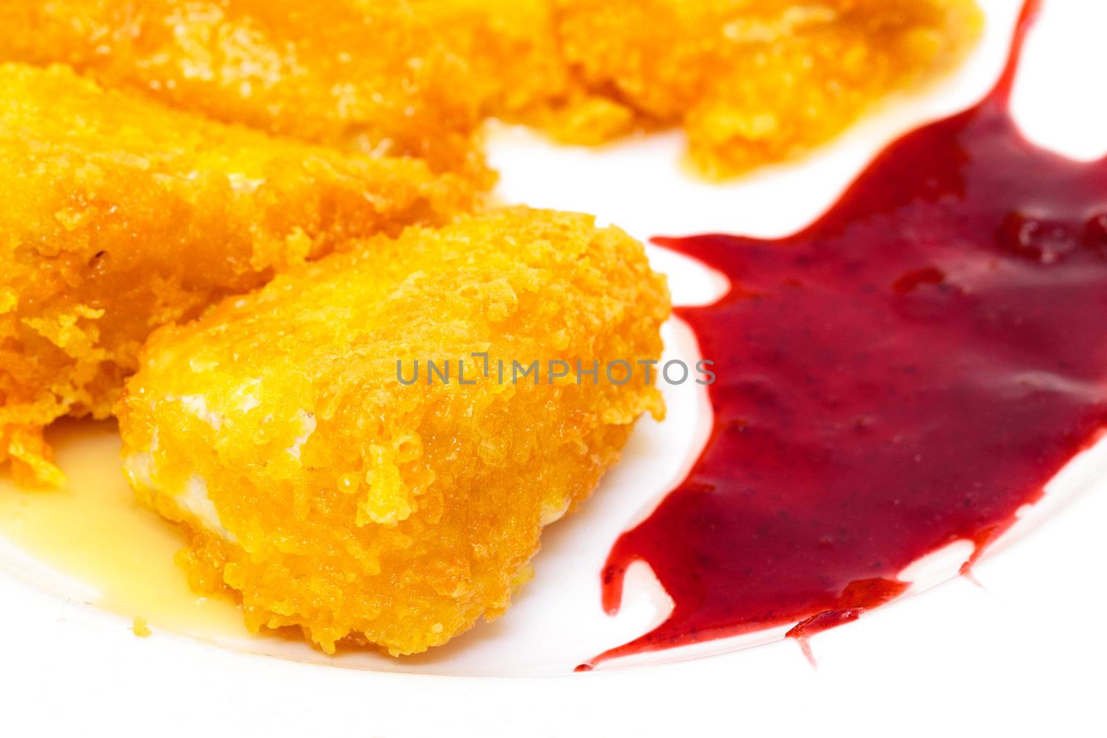 Fried Cheese with Berry Sauce on plate by Discovod