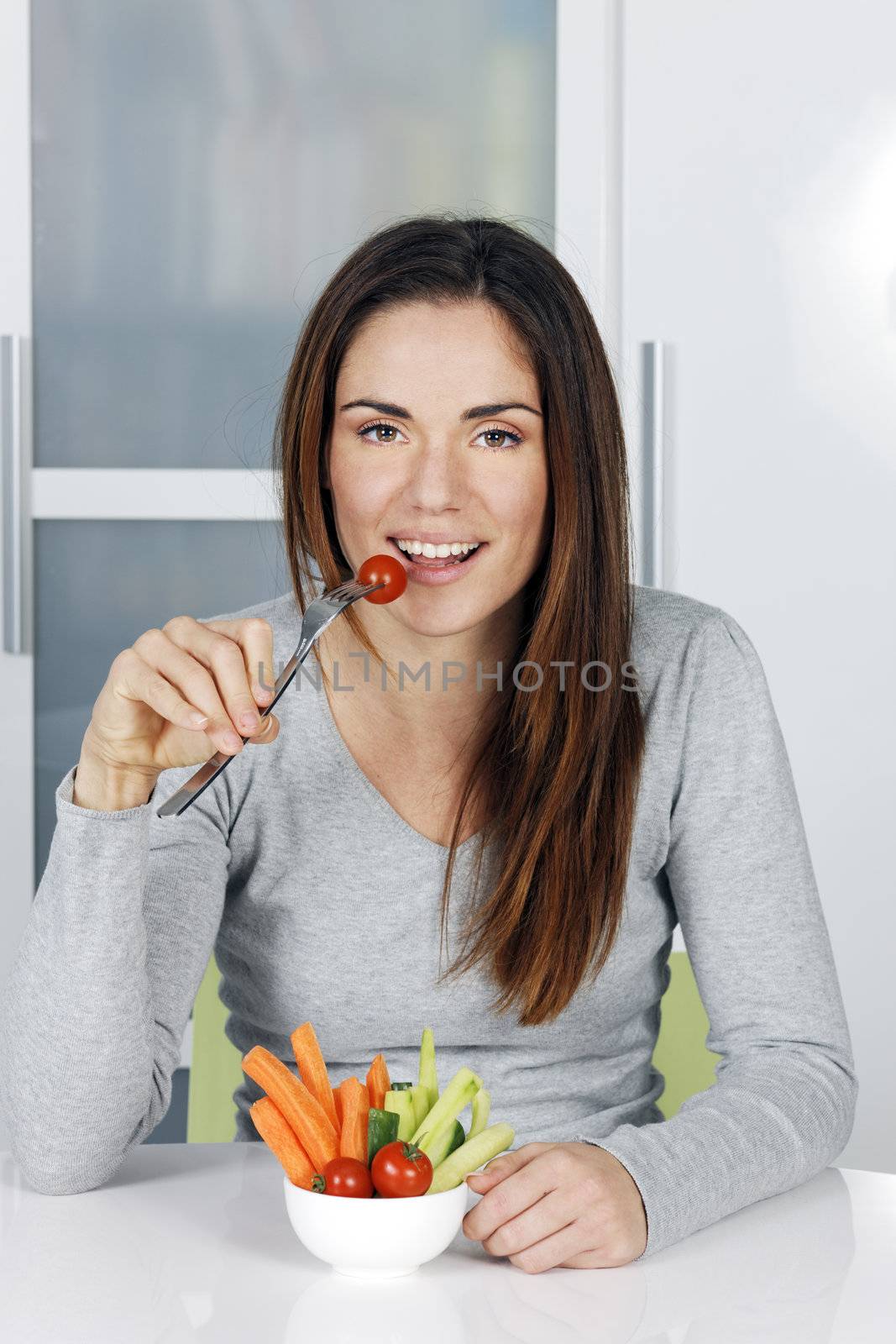 girl eating healthy food at home