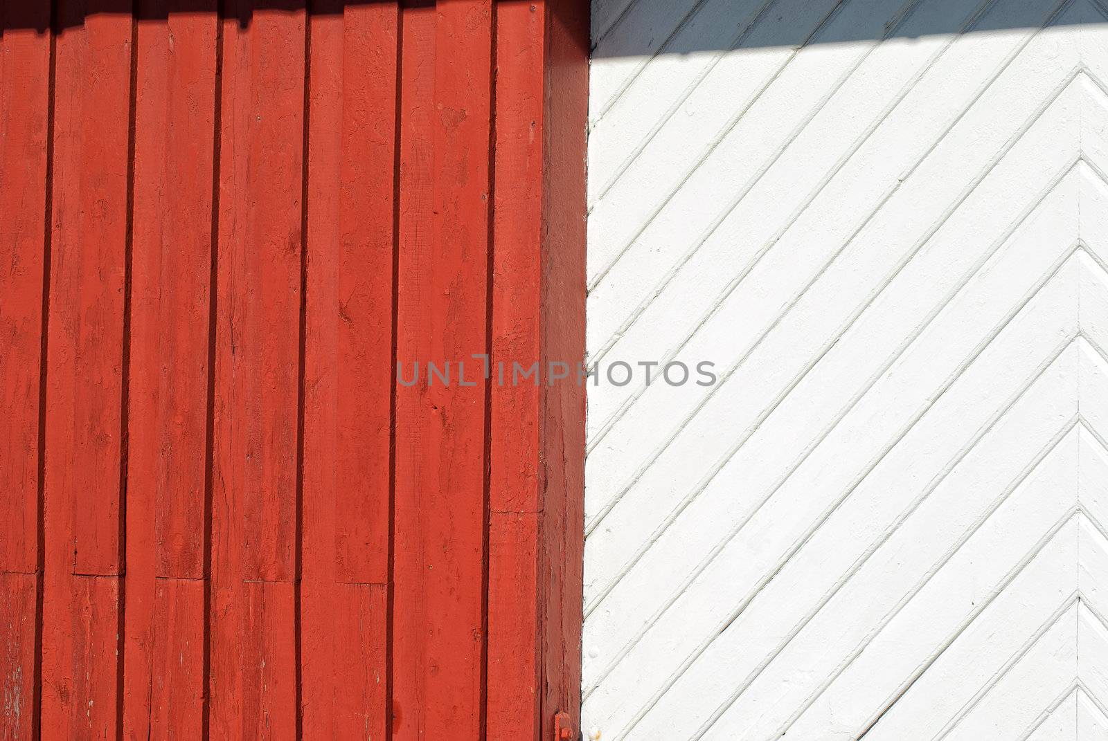 Old textured red and white painted wood pattern surface on a wall background