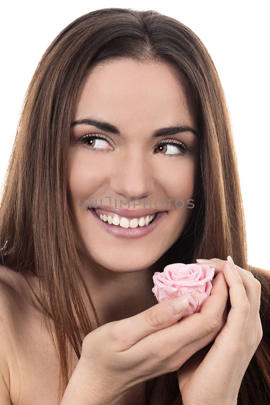 Beautiful woman with pink rose on white background