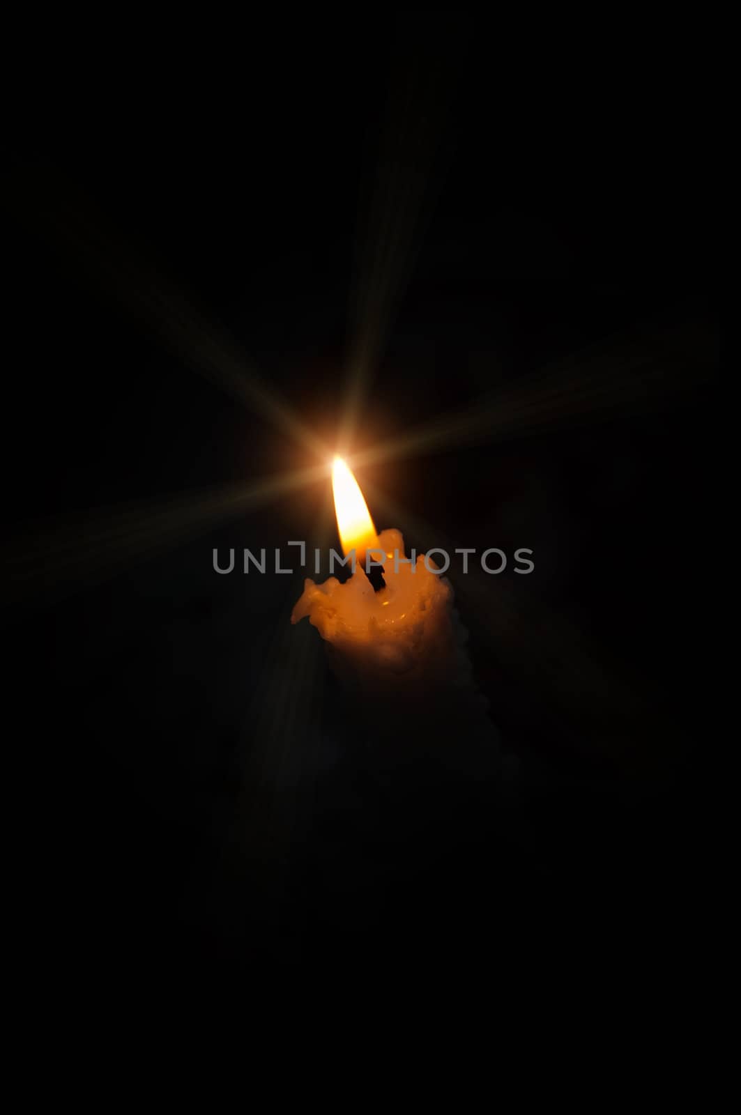 candle on a black