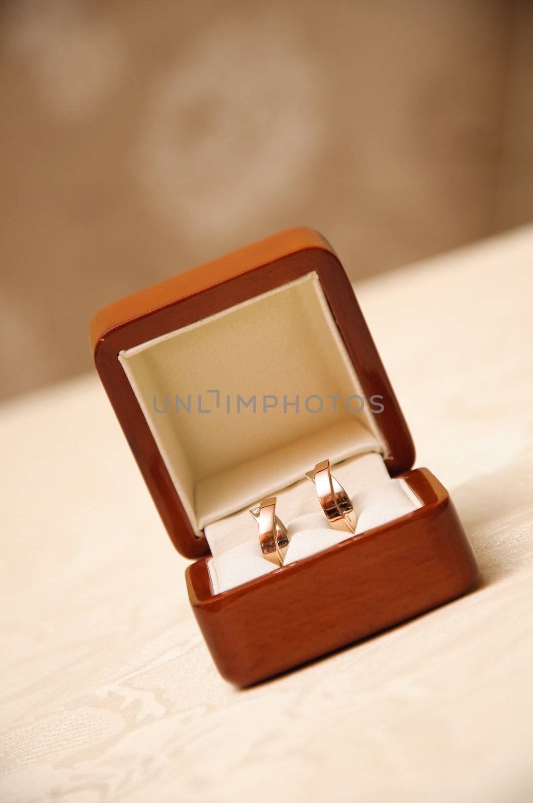 open box with wedding gold expensive rings