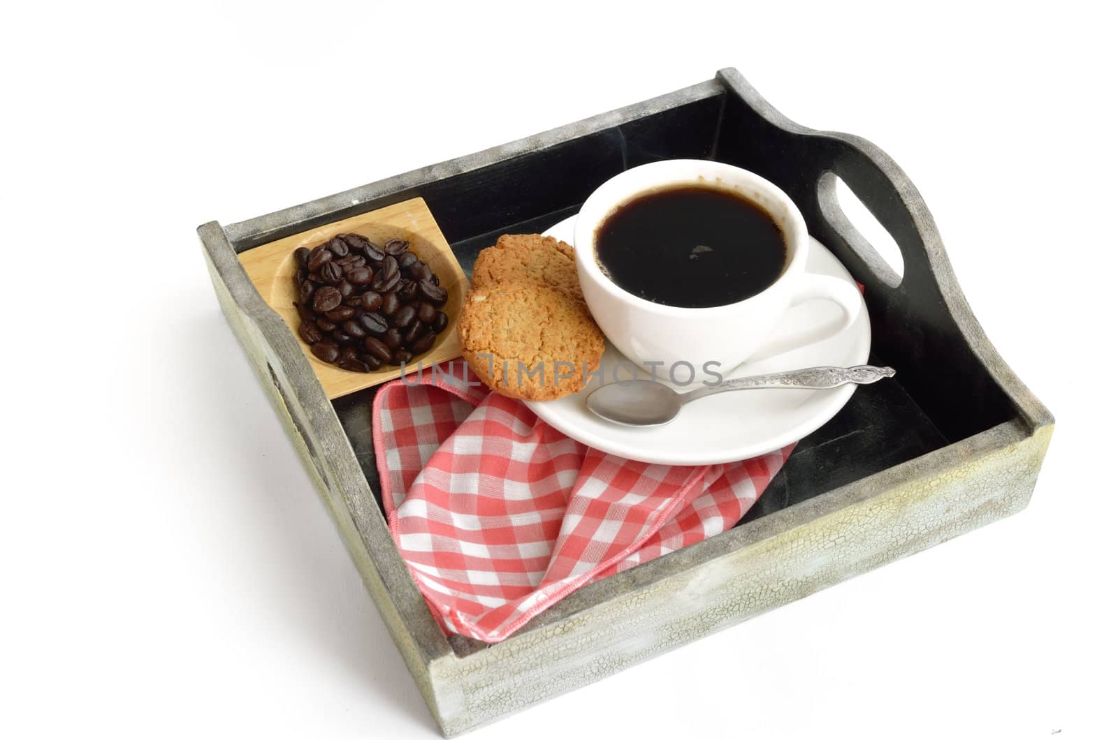 Coffee cup and beans with biscuit isolated on white