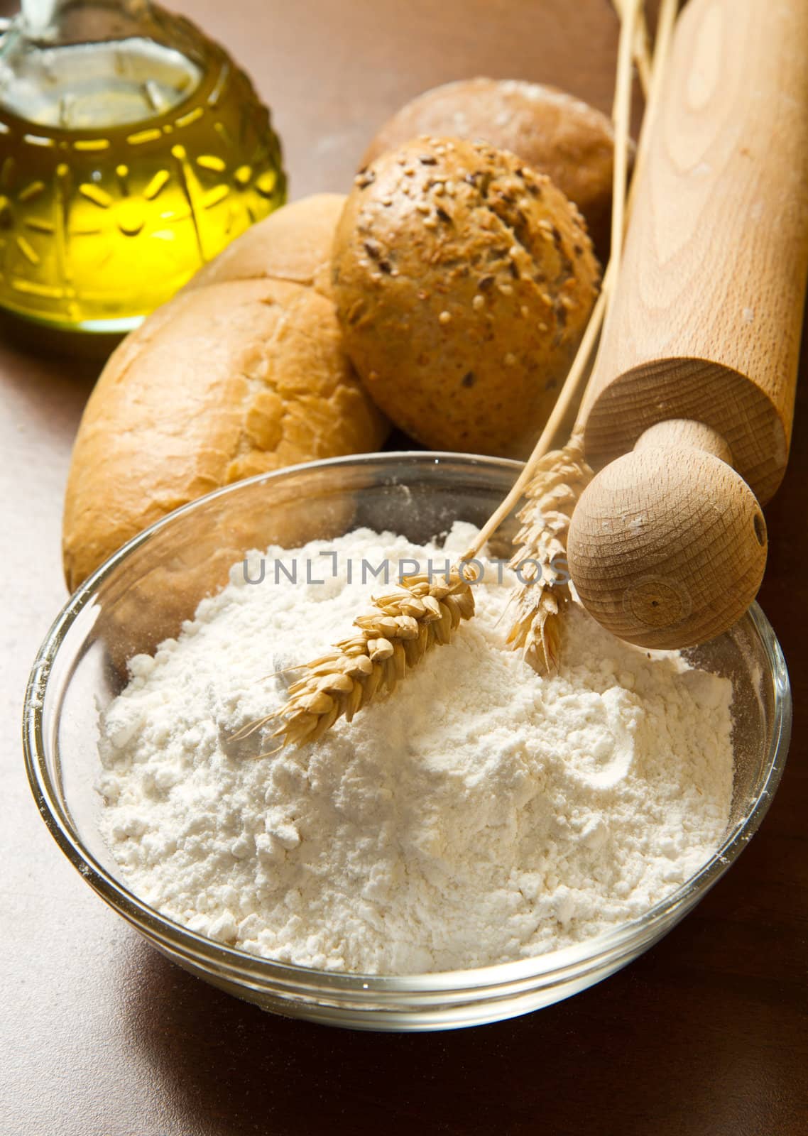 ingredients for homemade bread on wooden background