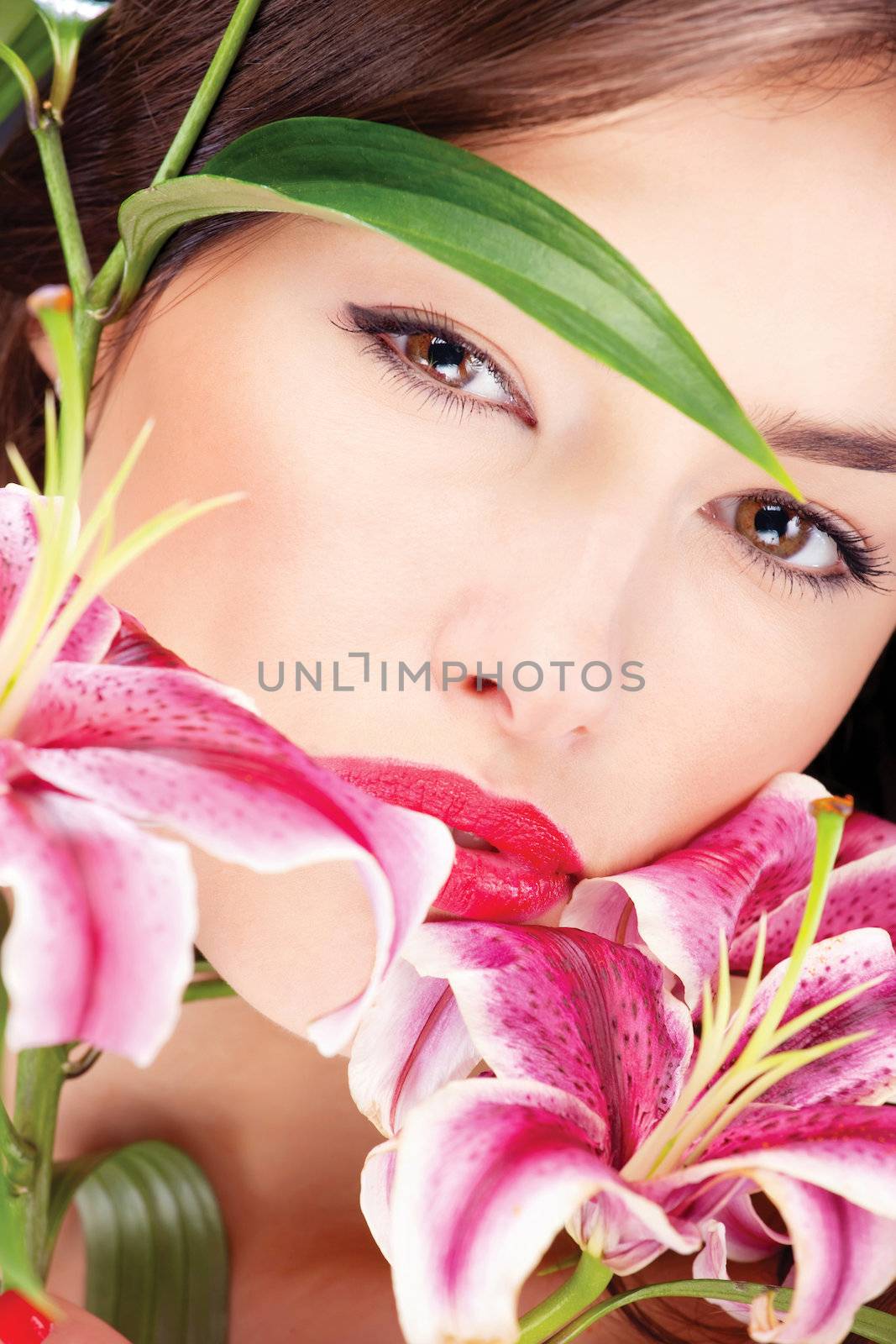 Close up of a pretty woman with flowers