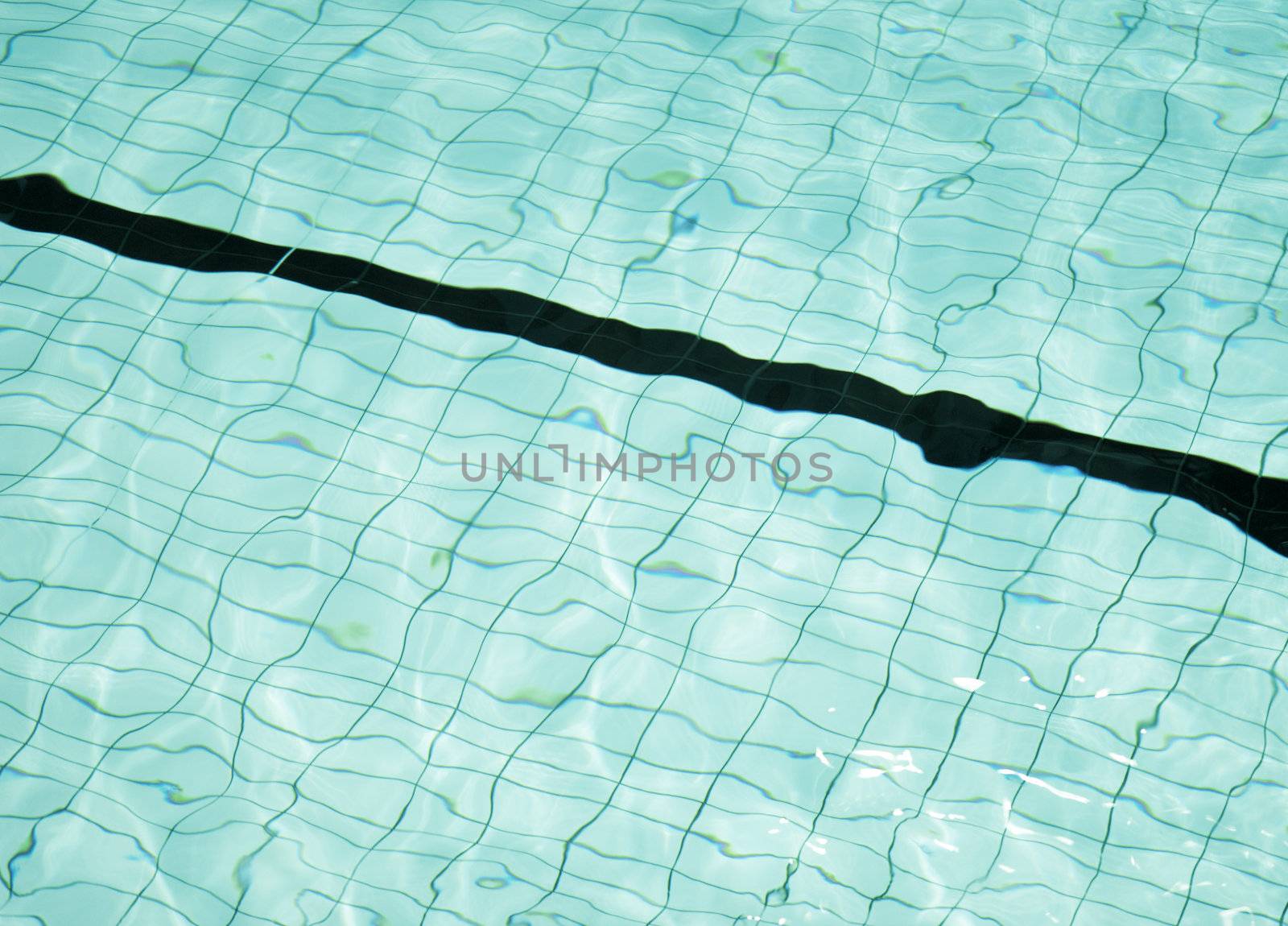 Background texture of lines in the bottom of a swimming pool.